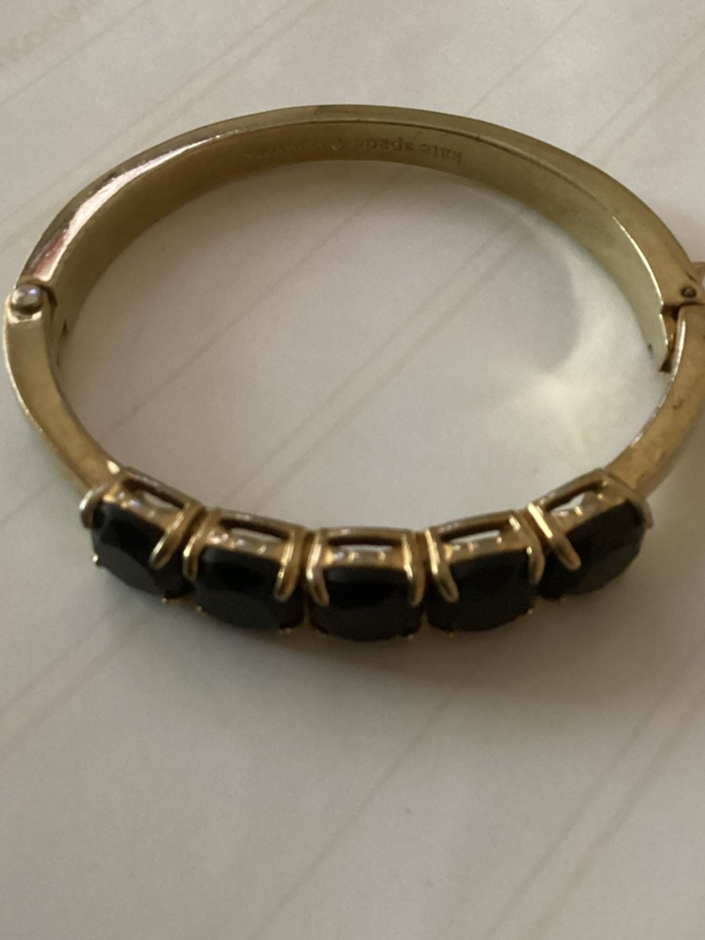 kate spade Gold-Tone Bracelet with Black Stones